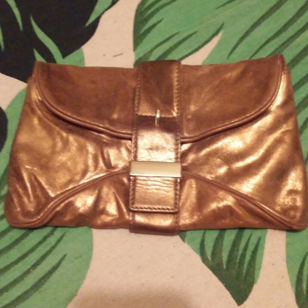 Woman's Gold Michael Kors Leather Clutch